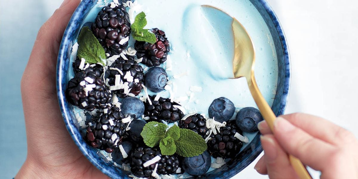 Tropical blue majik smoothie bowl with berries